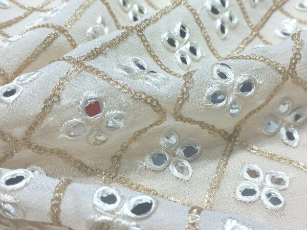 Mirror work embroidered fabric online india