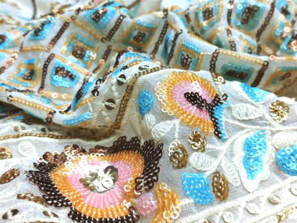 Designer embroidery fabric for lehenga price