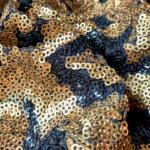 Gold and black sequin fabric for dress in india