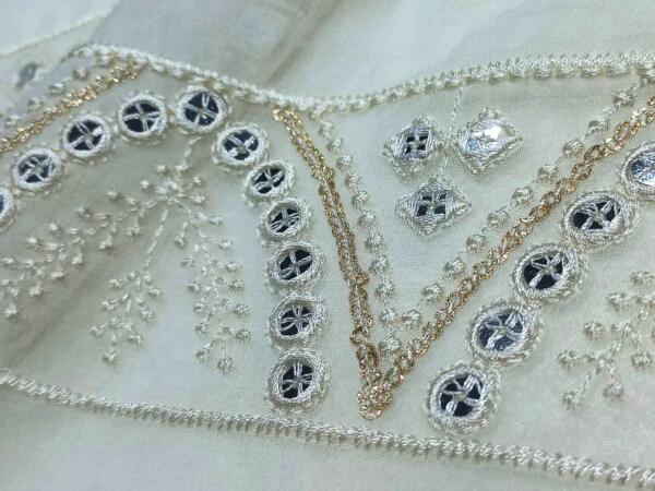 Lace mirror work embroidery