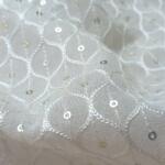 Dyeable white thread embroidered fabric for your designer garments online