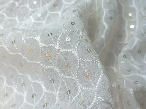 white thread embroidered fabric for your designer garments online