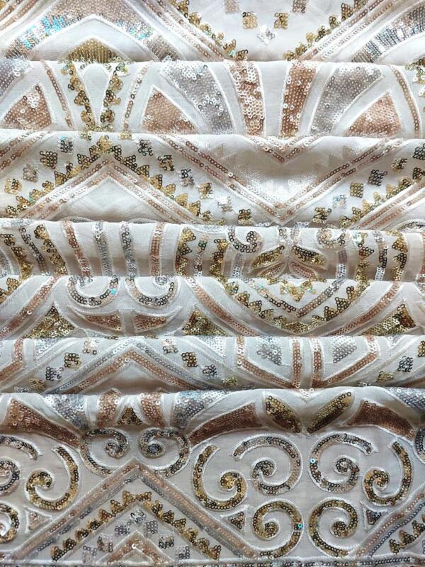 Beautiful Water Sequins With Multi Color Floral Embroidery On Peach Viscose Georgette Fabric