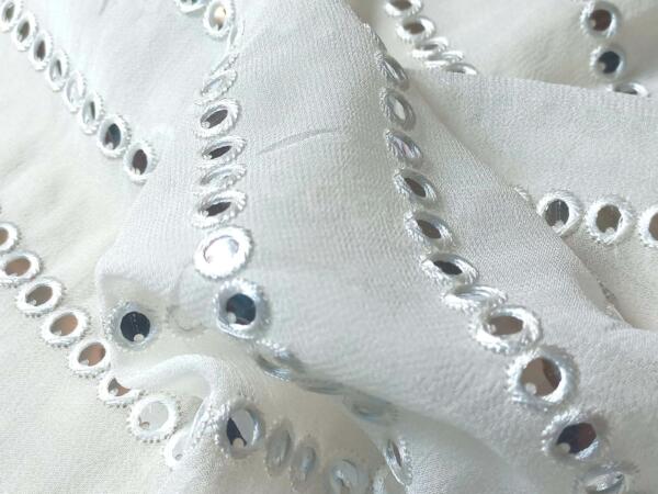 Get Embroidered Mirror work fabric for Womenswear