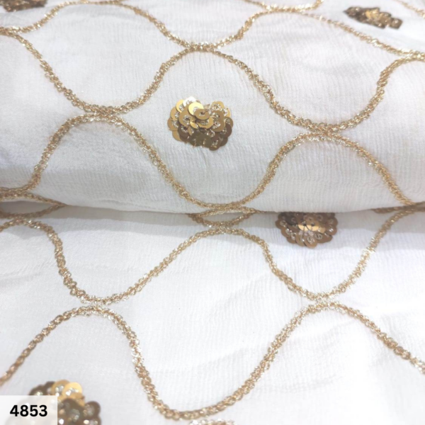 Dyeable Embroidered Chinnon fabric with Gold Sandwich sequins work.