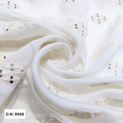 Buy off White cotton 7mm Silver Sequins Embroidered Butti fabric