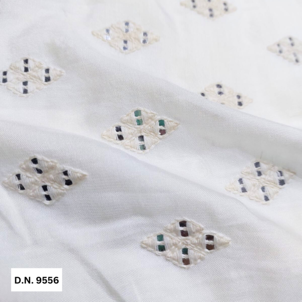 Shop Now off White cotton 7mm Silver Sequins Embroidered Butti fabric