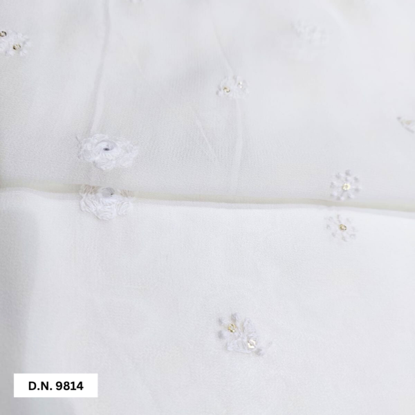 White embroidery motifs fabric