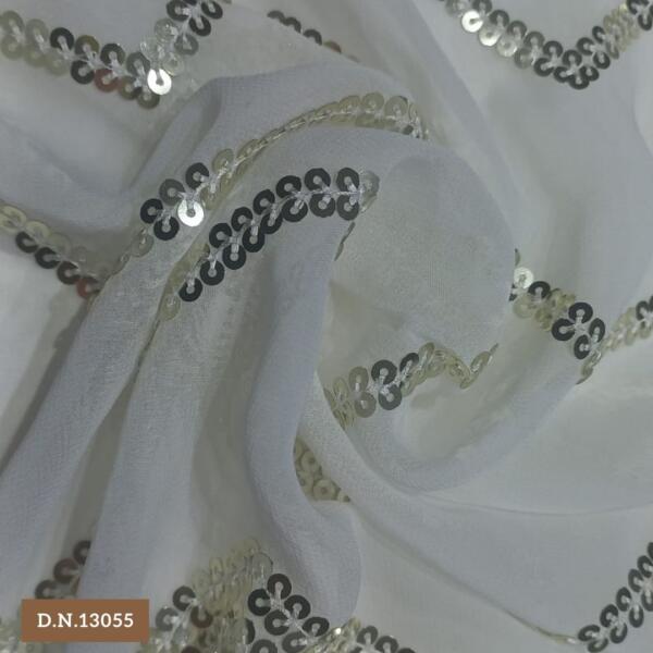 Close-Up of Intricate Sequin Work on Daman Style Fabric