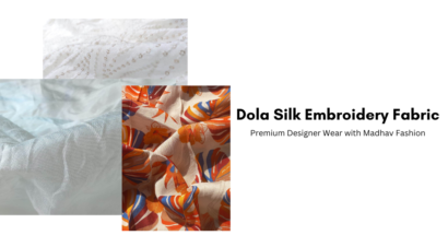 Dola silk embroidery fabric for designer wear by Madhav Fashion, featuring custom designs and premium quality for luxury garments.