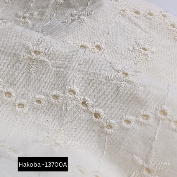 Premium 100% Cotton Lace Fabric with Hollow Embroidery - Wholesale Supplier